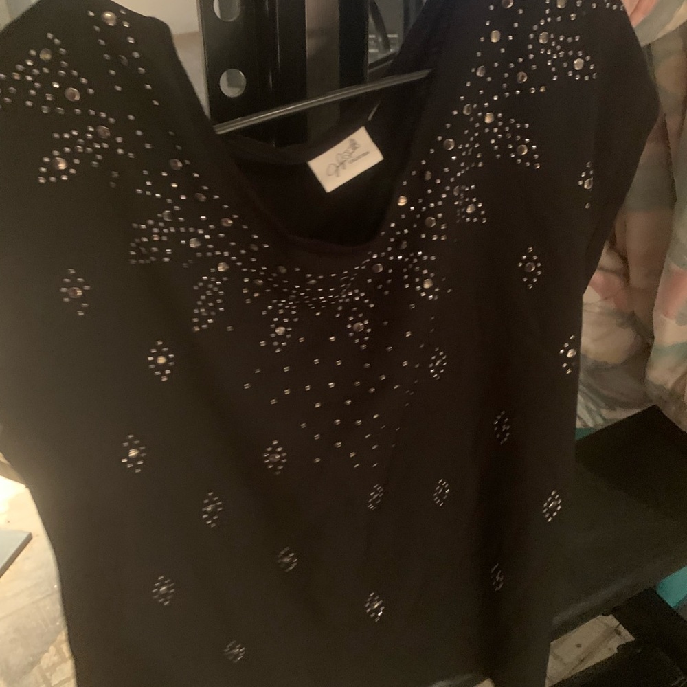 Black shirt with silver jewelry